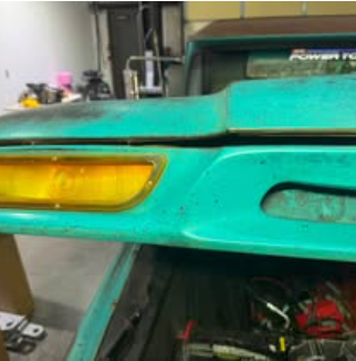Teal truck fender close-up